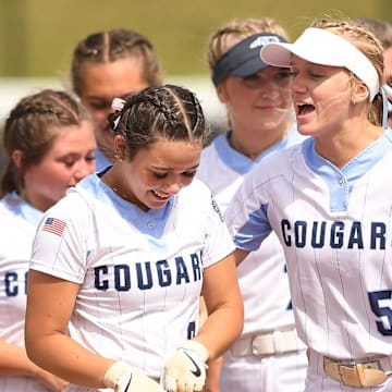 South Brunswick's #3 Tabatha Martins and #5 Gracin Johnson celebrate after they beat Kings Mountain 2-1 in the 3A softball state championship game at Duke's Jack Katz Stadium Durham, North Carolina. The softball team claimed its first state championship in program history by sweeping Kings Mountain on June 1, 2024. KEN BLEVINS/STARNEWS