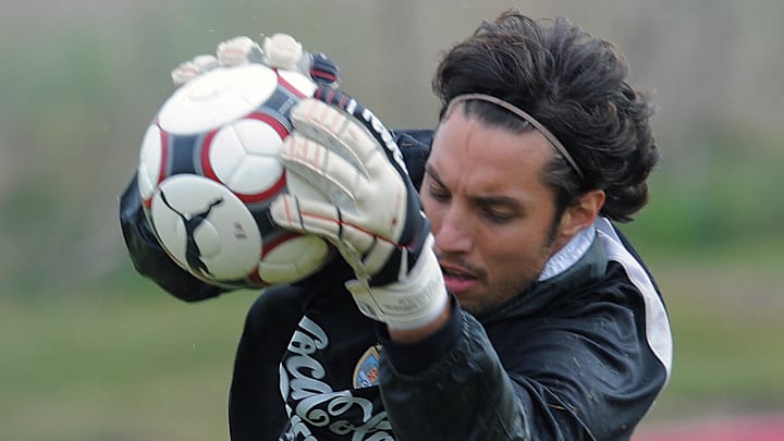 Uruguayan goalie Fabian Carini stops the