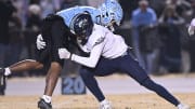 Hoggard defensive back Kamar Fulton makes a tackle against Cleveland in a 2023 NCHSAA playoff game. He had eight interceptions and nine pass breakups last season.