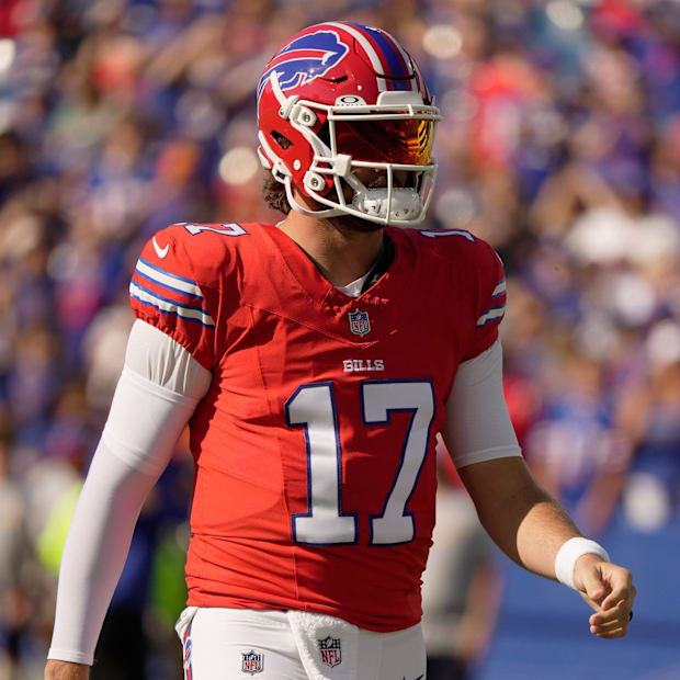 quarterback Josh Allen wears a red helmet