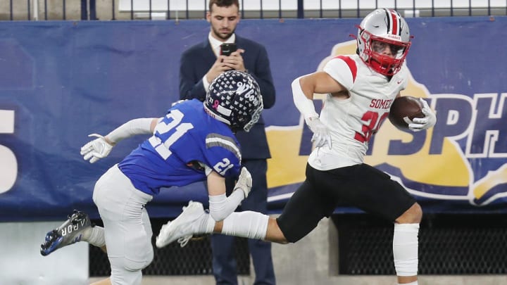 Somers Dean Palazzolo (30) runs for a touchdown after a catch against Whitesboro during the state championship game at the JMA Dome in Syracuse Dec. 2, 2023.