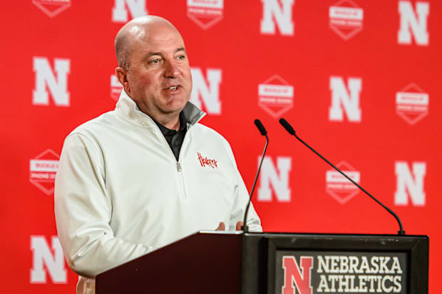 Athletic Director Troy Dannen speaks before introducing John Cook. 