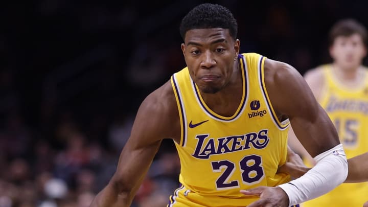 Apr 3, 2024; Washington, District of Columbia, USA; Los Angeles Lakers forward Rui Hachimura (28) dribbles the ball against the Washington Wizards at Capital One Arena.