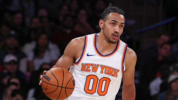Oct 9, 2023; New York, New York, USA; New York Knicks forward Jacob Toppin (00) dribbles up court during the second half against the Boston Celtics at Madison Square Garden. Mandatory Credit: Vincent Carchietta-Imagn Images