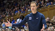Nov 16, 2024; Durham, North Carolina, USA; Duke Blue Devils head coach Jon Scheyer reacts during the first half against the Wofford Terriers at Cameron Indoor Stadium. Mandatory Credit: Zachary Taft-Imagn Images