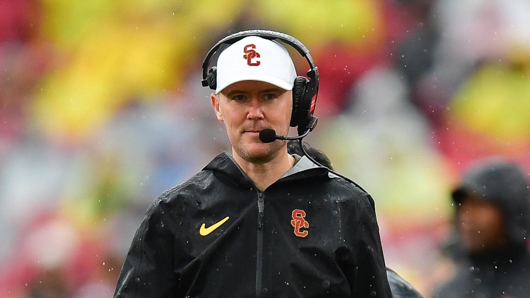 Nov 15, 2025; Los Angeles, California, USA; Southern California Trojans head coach Lincoln Riley watches game action against the Iowa Hawkeyes during the first half at the Los Angeles Memorial Coliseum. Mandatory Credit: Gary A. Vasquez-Imagn Images