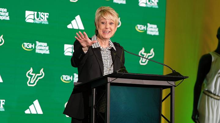 USF head women's basketball coach Kristy Curry speaking to the media. 
