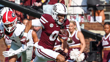 Mississippi State Bulldogs wide receiver Brenen Thompson (0) runs with the ball against the Georgia Bulldogs during the second half at Davis Wade Stadium at Scott Field. 