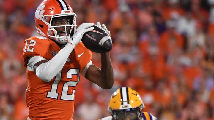 Clemson Tigers wide receiver Bryant Wesco Jr. (12) catches a pass while being defended by LSU Tigers cornerback PJ Woodland (11) Saturday, Aug. 30, 2025 during the NCAA football game at Memorial Stadium in Clemson, South Carolina. LSU Tigers won 17-10.
