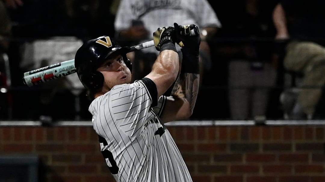 Vanderbilt's Braden Holcomb (26) flies out to Louisville left fielder Zion Rose during the seventh inning of the Nashville Regional NCAA Baseball Tournament game at Hawkins Field Saturday, May 31, 2025, in Nashville, Tenn.