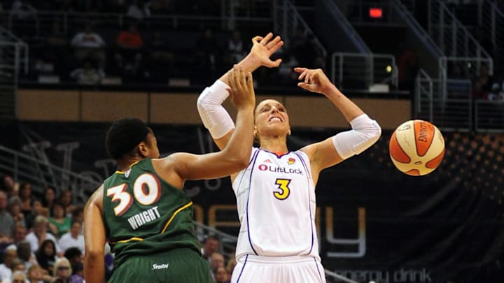 Sep 5, 2010; Phoenix, AZ, USA; Phoenix Mercury guard Diana Taurasi (3) is fouled by Seattle Storm guard Tanisha Wright (30) during the first half in game two of the western conference finals in the 2010 WNBA Playoffs at US Airways Center.  Mandatory Credit: Jennifer Stewart-Imagn Images