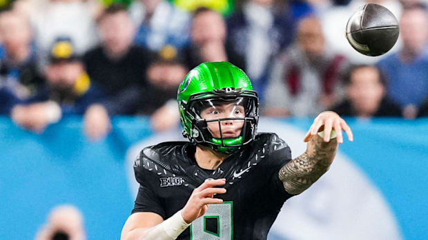 Oregon Ducks quarterback Dillon Gabriel (8) throws a pass Saturday, Dec. 7, 2024, during the Big Ten Championship