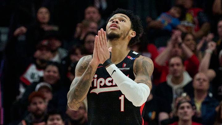 Portland, Oregon, USA; Portland Trail Blazers guard Anfernee Simons (1) reacts after being fouled and scoring a basket during the second half against the Miami Heat at Moda Center. on January 11, 2025.