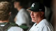 Michigan State's head coach Jake Boss Jr., right, talks with Sam Thompson in the dugout during the first inning in the game against Purdue Fort Wayne on Wednesday, April 19, 2023, at the McLane Baseball Stadium in East Lansing Mall.

230419 Msu Purdue Fw Baseball 007a