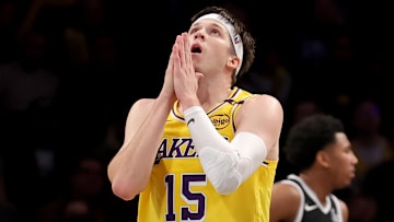 Mar 10, 2025; Brooklyn, New York, USA; Los Angeles Lakers guard Austin Reaves (15) reacts during the third quarter against the Brooklyn Nets at Barclays Center. Mandatory Credit: Brad Penner-Imagn Images