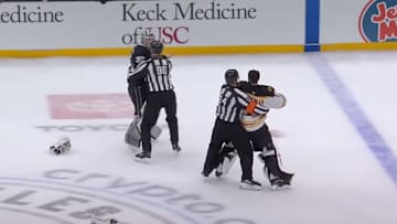 Jeremy Swayman and Darcy Kuemper tried to fight during the Kings - Bruins game on Sunday.