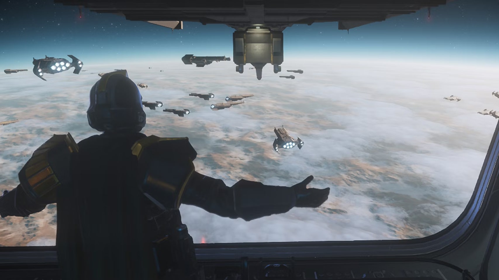 Helldivers 2 screenshot showing a Helldiver overseeing a fleet of Super Destroyers.