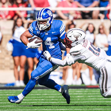 BYU RB LJ Martin runs the football against Texas Tech
