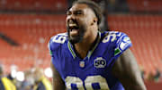 Nov 2, 2025; Landover, Maryland, USA; Seattle Seahawks defensive end Leonard Williams (99) reacts to the win against the Washington Commanders at Northwest Stadium. 