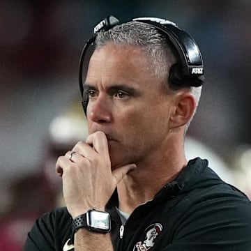 Dec 30, 2023; Miami Gardens, FL, USA; Florida State Seminoles head coach Mike Norvell reacts against the Georgia Bulldogs during the second half in the 2023 Orange Bowl at Hard Rock Stadium. Mandatory Credit: Jasen Vinlove-Imagn Images