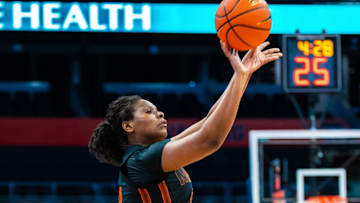 Darrione Rogers shooting a three against Syracuse in loss on the road.