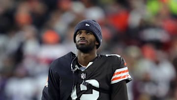 Cleveland Browns quarterback Shedeur Sanders (12) waits for his opportunity as head coach Kevin Stefanski watches Dillon Gabriel lead the offense during the first half of an NFL football game at Huntington Bank Field, Nov. 16, 2025, in Cleveland, Ohio.