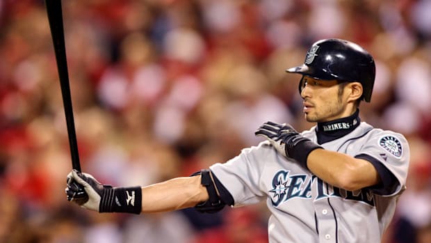 Seattle Mariners’ Ichiro Suzuki performs his batter’s box ritual