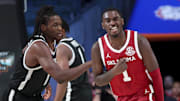 Oklahoma Sooners guard Kobe Elvis (1) and Providence Friars guard Jayden Pierre