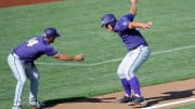 Jun 19, 2016; Omaha, NE, USA; TCU Horned Frogs infielder Luken Baker (19) celebrates with assistant coach Bill Mosiello after a ninth inning home run against the Texas Tech Red Raiders in the 2016 College World Series at TD Ameritrade Park. TCU won 5-3. Mandatory Credit: Steven Branscombe-USA TODAY Sports