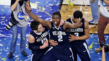 Villanova Wildcats guard Ryan Arcidiacono and forward Kris Jenkins and guard Josh Hart celebrate after defeating the North Carolina Tar Heels in the championship game of the 2016 NCAA Men's Final Four at NRG Stadium. Villanova won 77-74. 