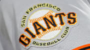The San Francisco Giants logo on the sleeve of a player's uniform.