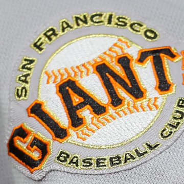 The San Francisco Giants logo on the sleeve of a player's uniform.
