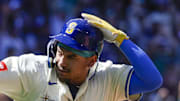 Seattle Mariners first baseman Josh Naylor (12) points to the Mariners dugout after hitting a solo-home run against the Tampa Bay Rays  during the seventh inning at T-Mobile Park on Aug. 10. 