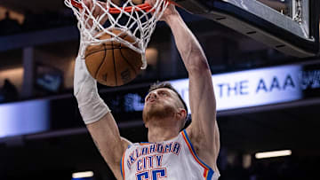 Nov 25, 2024; Sacramento, California, USA; Oklahoma City Thunder center Isaiah Hartenstein (55) dunks the ball against the Sacramento Kings during the third quarter at Golden 1 Center. Mandatory Credit: Ed Szczepanski-Imagn Images
