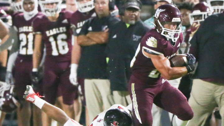 RB Connor Mathews escapes a tackle on the sideline during the Niceville South Sumter football game at Niceville.