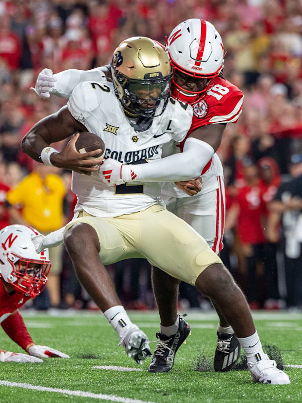 Nebraska linebacker Princewill Umanmielen sacks Colorado quarterback Shedeur Sanders. The play was negated by an offsides.