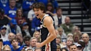 Dec 5, 2025; Nashville, TN, USA;  Gonzaga Bulldogs forward Braden Huff (34) reacts after a made basket and the foul against the Kentucky Wildcats during the first half at Bridgestone Arena.