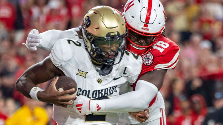 Nebraska linebacker Princewill Umanmielen sacks Colorado quarterback Shedeur Sanders. The play was negated by an offside penalty.