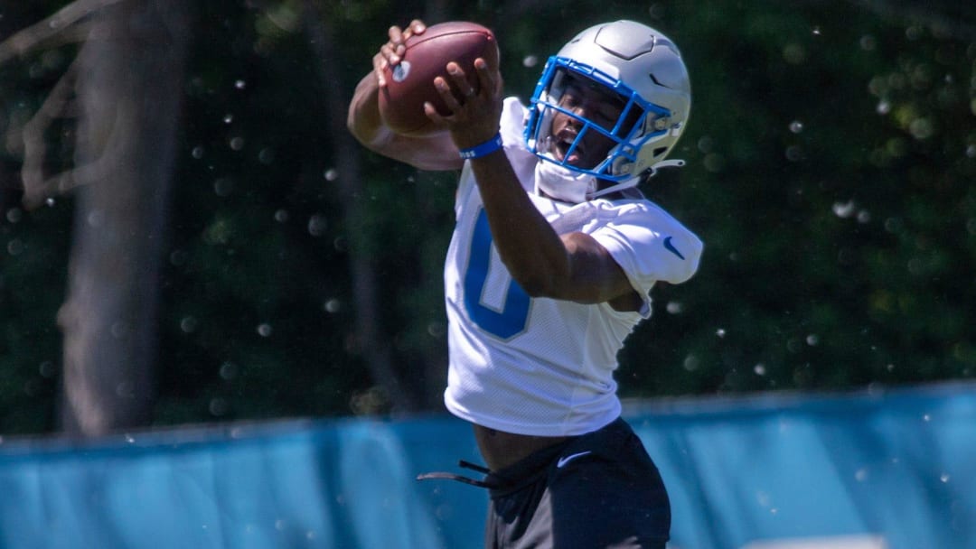 Lions CB Terrion Arnold practices catching during the organized team activities in Allen Park on Thursday, May 23, 2024.