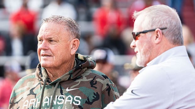 Arkansas coach Sam Pittman with athletic director Hunter Yurachek before the game