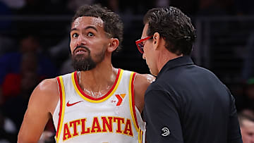 Atlanta Hawks guard Trae Young #11 and head coach Quin Snyder