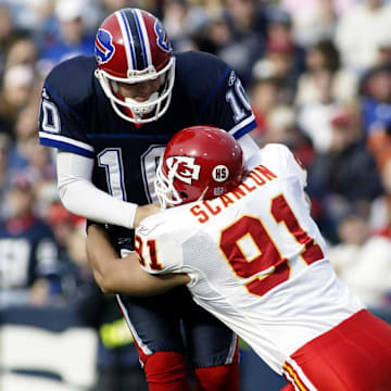 Nov 13, 2005; Orchard Park, NY, USA; FILE PHOTO; Kansas City Chiefs linebacker Rich Scanlon (91) sacks Buffalo Bills quarterback Kelly Holcomb (10) at Ralph Wilson Stadium. The Bills defeated the Chiefs 14-3. Mandatory Credit: MPS-Imagn Images