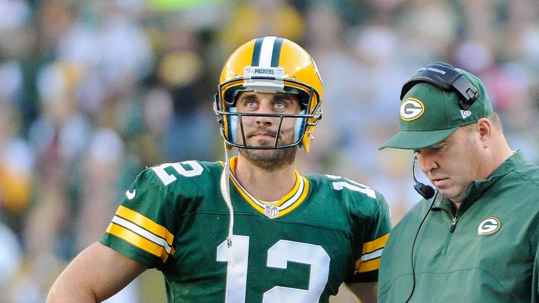 Green Bay Packers quarterback Aaron Rodgers (12) and head coach Mike McCarthy