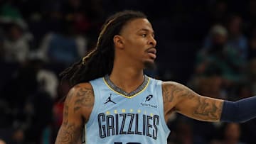 Memphis Grizzlies guard Ja Morant gestures during the second quarter against the Dallas Mavericks.