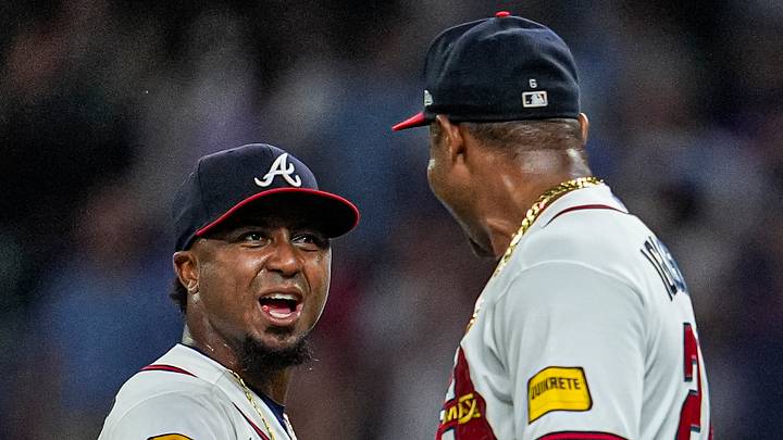 Jul 1, 2026; Cumberland, Georgia, USA; Atlanta Braves second baseman Ozzie Albies (1) and pitcher Raisel Iglesias (26) react after defeating the St. Louis Cardinals at Truist Park. Mandatory Credit: Dale Zanine-Imagn Images
