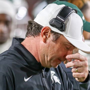 Michigan State head coach Jonathan Smith looks downward during the Spartans' game against USC on Sept. 20, 2025.