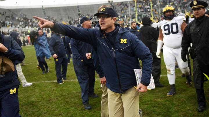 What we know about the NCAA rule violations that led to Michigan football suspending head coach Jim Harbaugh.