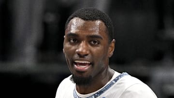 Memphis Grizzlies guard Vince Williams Jr. pushes Dallas Mavericks guard Klay Thompson.