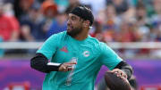 Miami Dolphins quarterback Tua Tagovailoa drops back to pass during the 2024 Pro Bowl at Camping World Stadium.