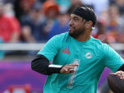 Miami Dolphins quarterback Tua Tagovailoa drops back to pass during the 2024 Pro Bowl at Camping World Stadium.